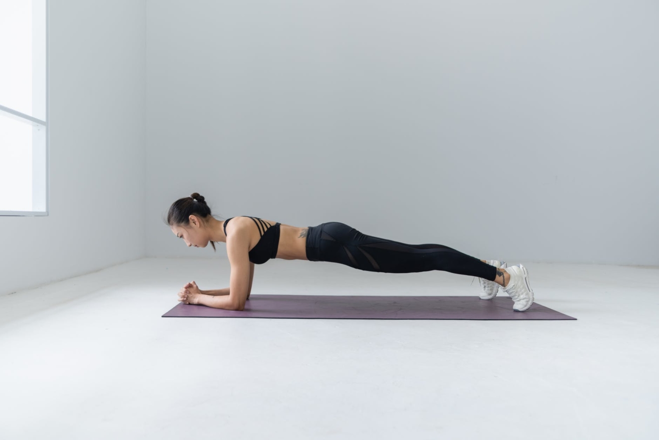 photo of woman doing yoga