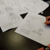 Enfant dessinant en atelier bande dessinée à l'ECLA